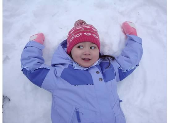 julia-Toddler making snow angels