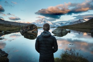 Person overlooking pond