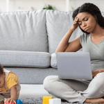 mom working with child, parenting during COVID