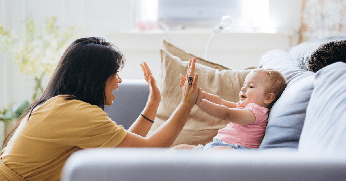 babysitter playing pattycake