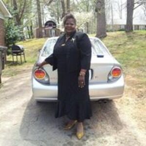 mom in front of car