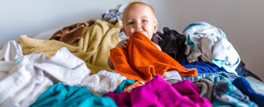 baby in laundry